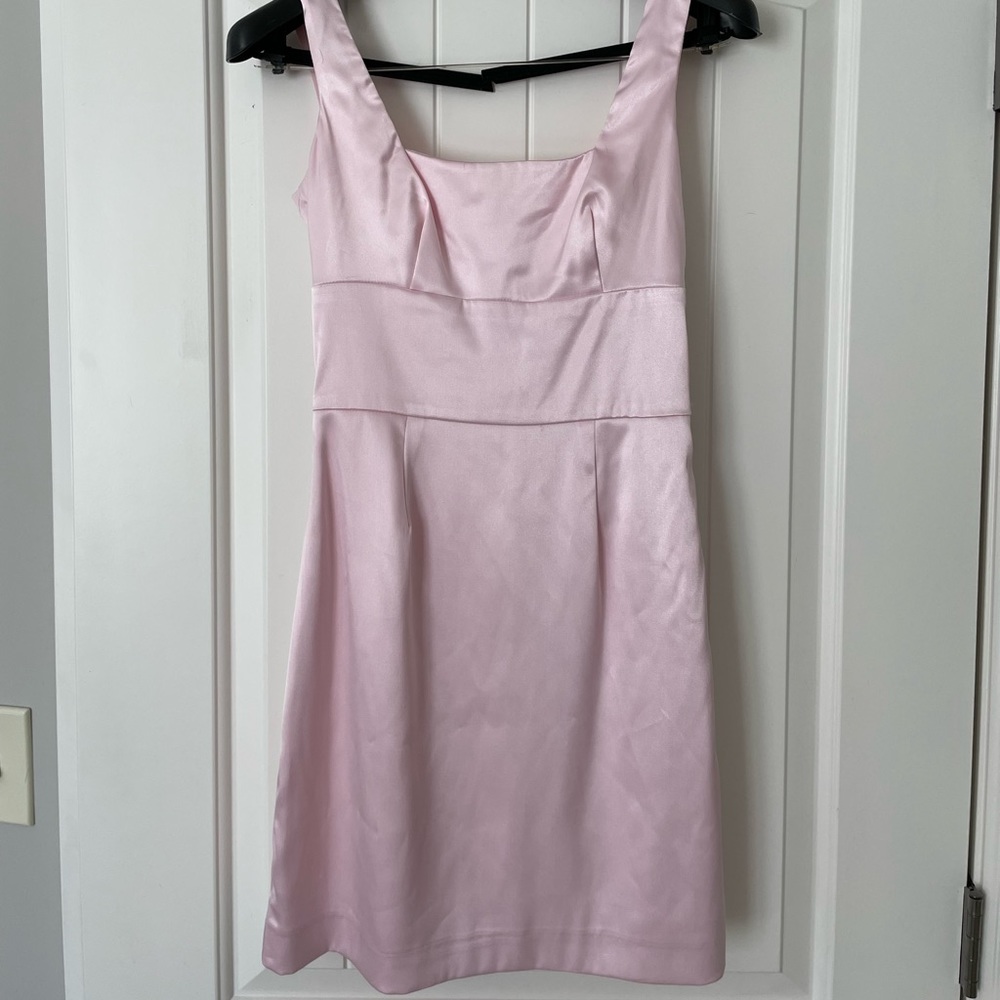 Pink mini dress with bow detail